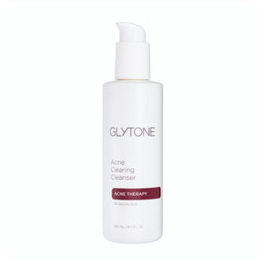 Glytone: botella de limpiador para acné con espuma suave ideal para limpieza diaria de poros.