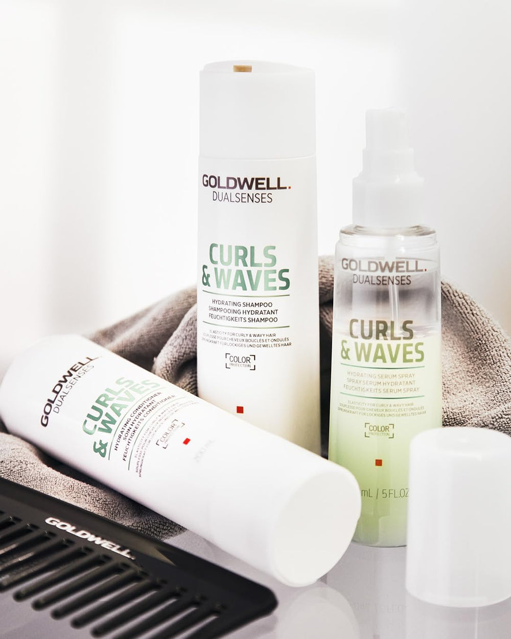 Goldwell Dualsenses Curls & Waves, textura cremosa, experiencia de lavado suave.