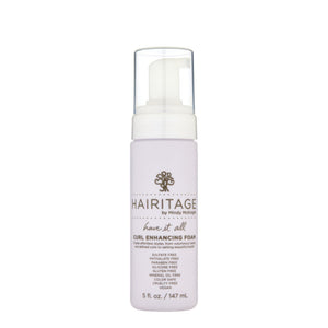 Espuma definidora Hairitage Have It All en botella, rizos más definidos.