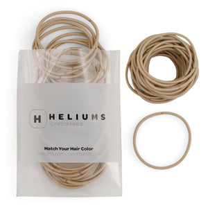 Heliums elásticos para cabello fino en empaque, prácticos para tener a mano.
