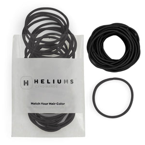 Heliums lazo delgado negro 2 mm, sujeción estable para cabello fino.