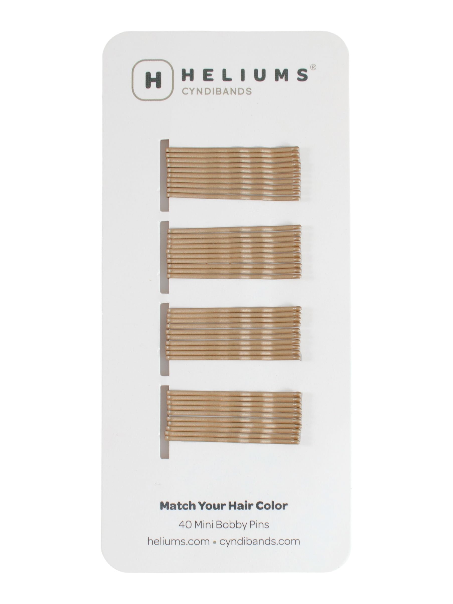 Heliums mini horquillas rubio oscuro en empaque práctico, ideal para organizar tu neceser