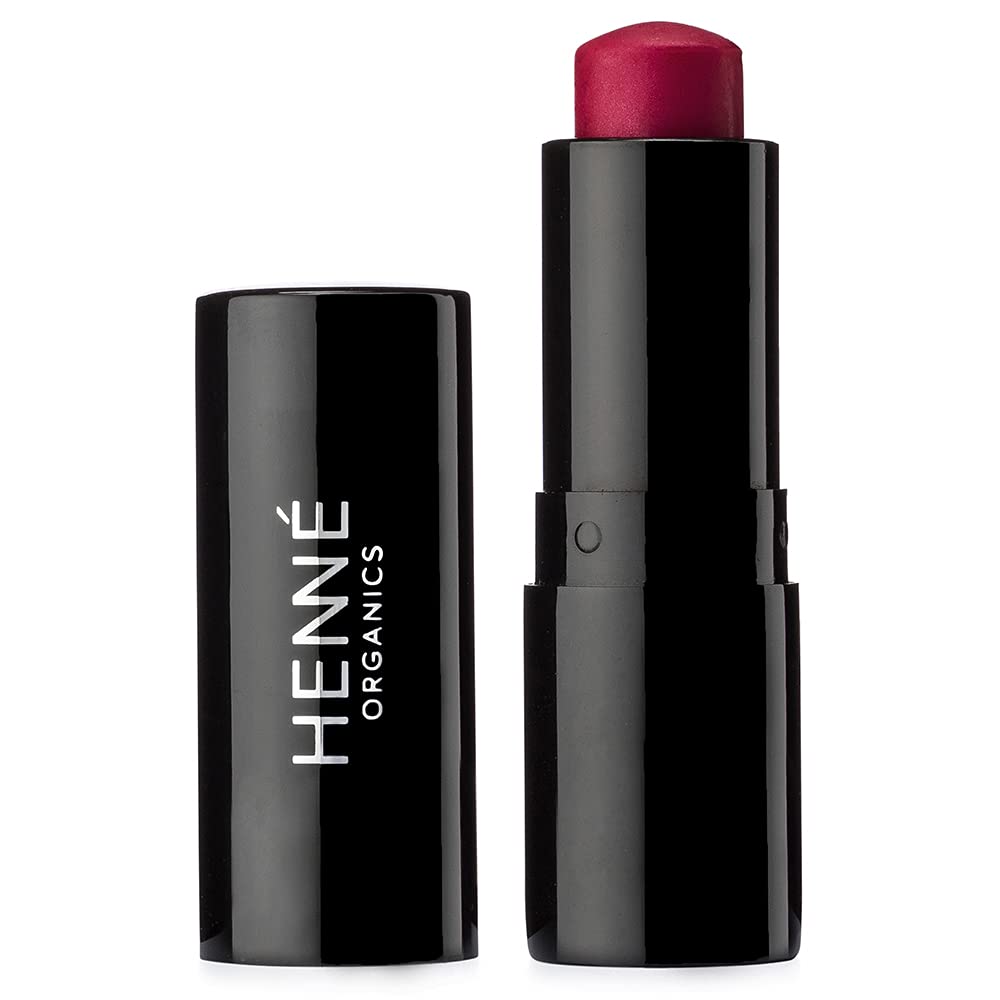 Tinte labial de lujo Henné Organics en aplicación suave para labios hidratados y color natural.