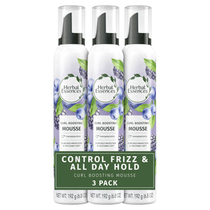 Herbal Essences Curl Boosting Mousse en envase, definición suave de rizos para uso diario.