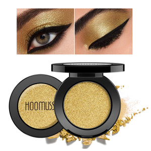 HOOMUSS sombra dorada – pieza con brillo suave para look diario.