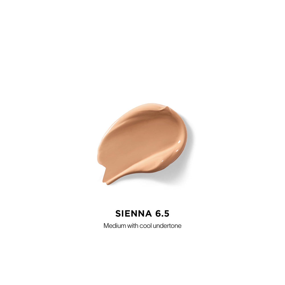 Hourglass Vanish Airbrush Concealer textura cremosa que se difumina con facilidad.