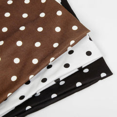 Diadema Huachi con puntos marrones para look bohemio y suave comodidad.