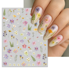 IDDFEVE uñas naturales y artificiales decoradas con suavidad.
