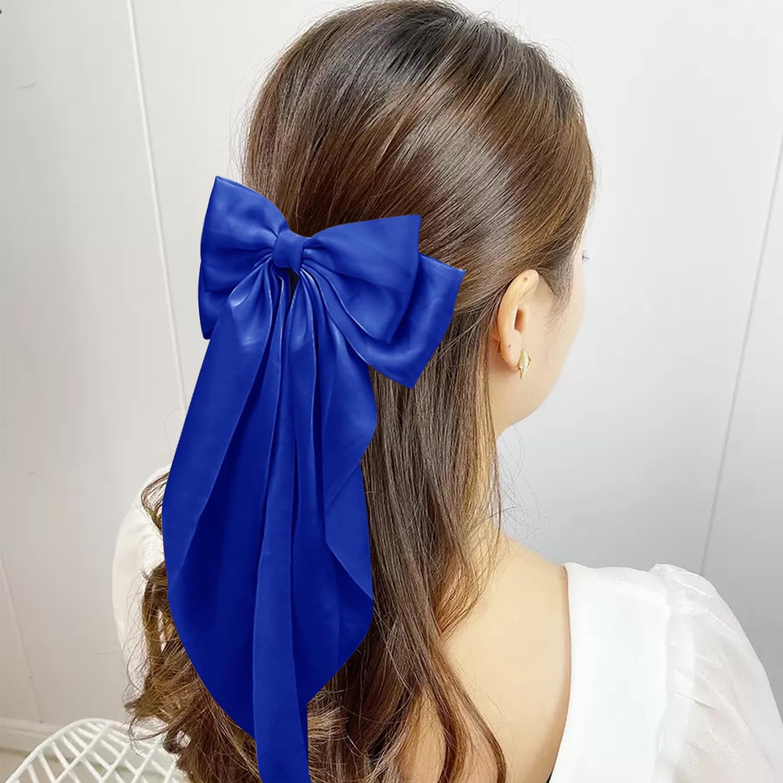 Clip de cabello Illpta con arco satinado para sujetar con estilo