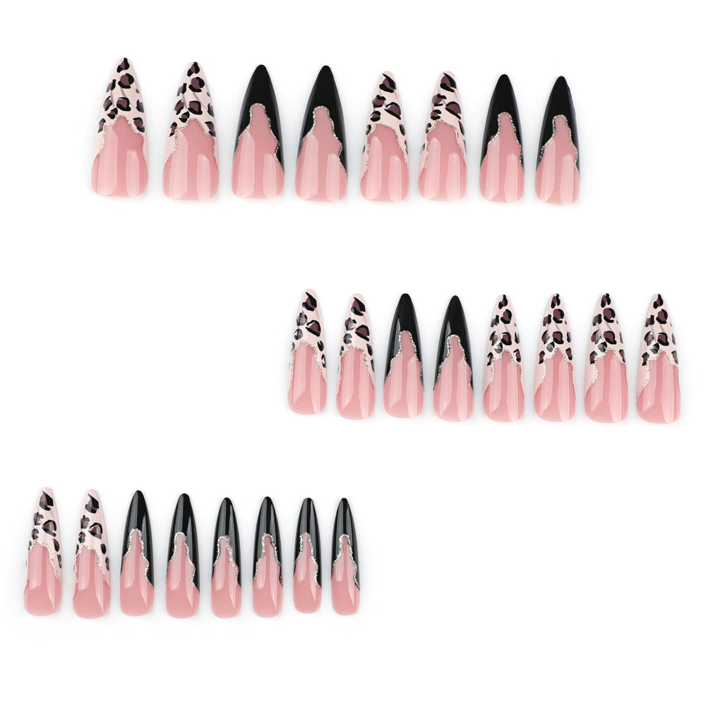 IMRAIN uñas stiletto negras con leopardo, acabado gloss para fiestas.