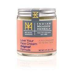 Crema Love Your Face de Indian Meadow Herbals, envase práctico para cuidado diario.
