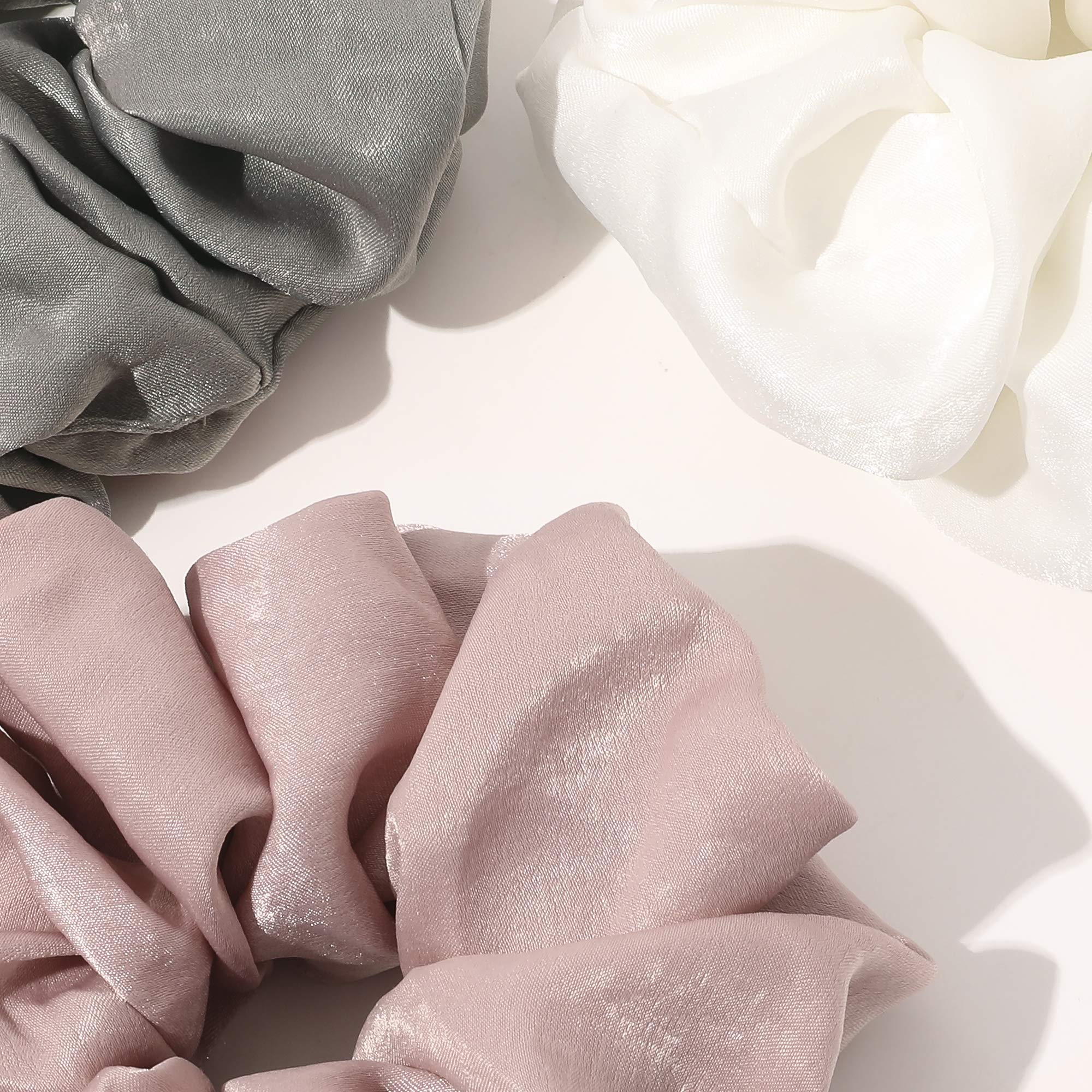 Ivyu Scrunchie seda satinada de color rosa, ideal para sujetar peinados.