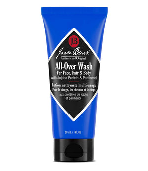 Botella de Jack Black All Over Wash con aroma cítrico y menta para piel y cabello.