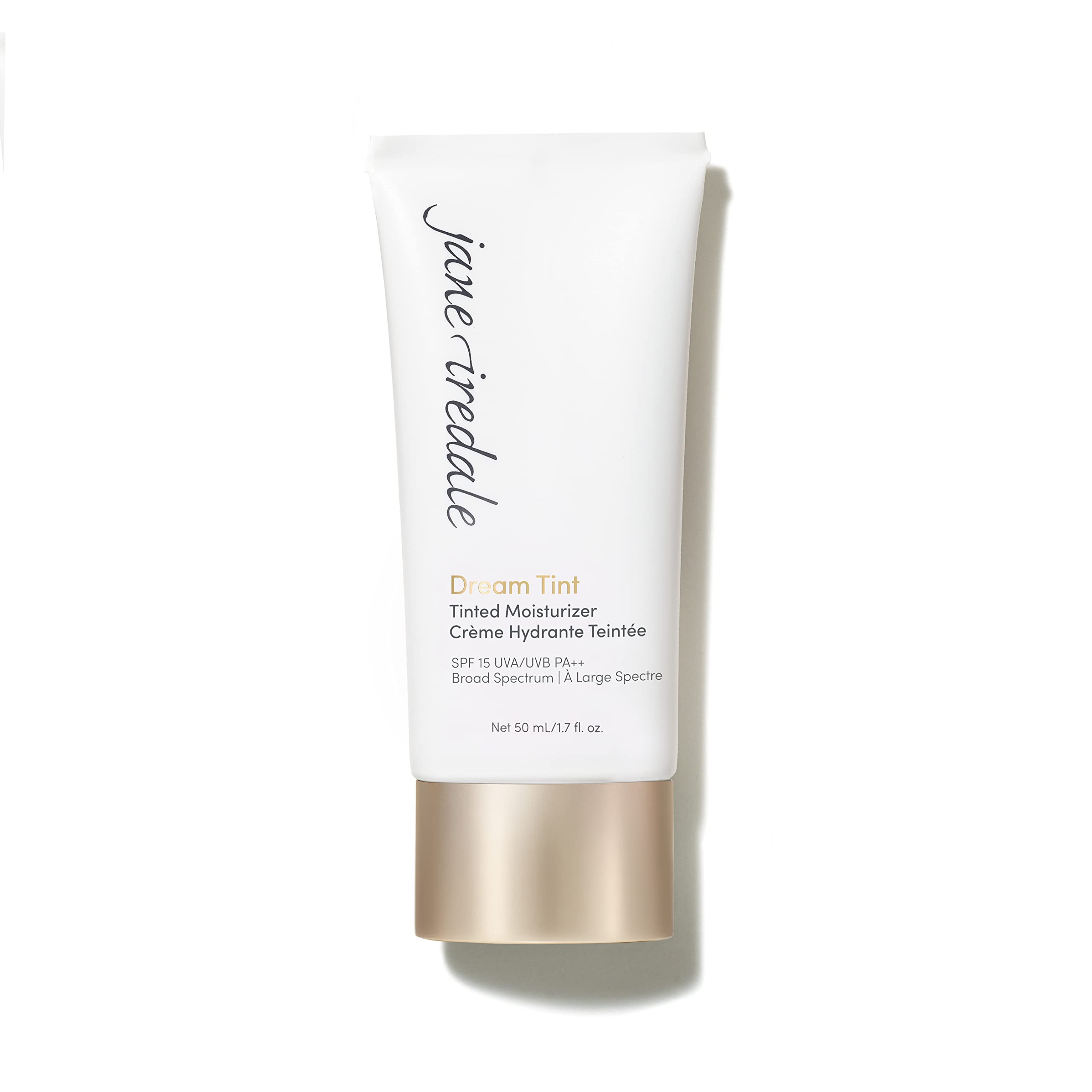 Dream Tint de jane iredale en envase con tono medio y SPF 15 para piel radiante.
