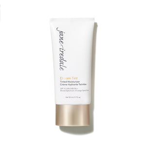 Dream Tint de jane iredale en envase con tono medio y SPF 15 para piel radiante.