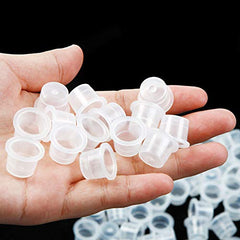 Jconly tapa anti-derrame para tinta tatuaje, mantiene la zona de trabajo limpia.