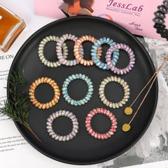 JessLab espirales para cabello, uso como coleta para peinados rápidos.
