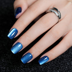 Uñas postizas Jofay Fashion azul ojo de gato, acabado brillante para aspecto elegante.