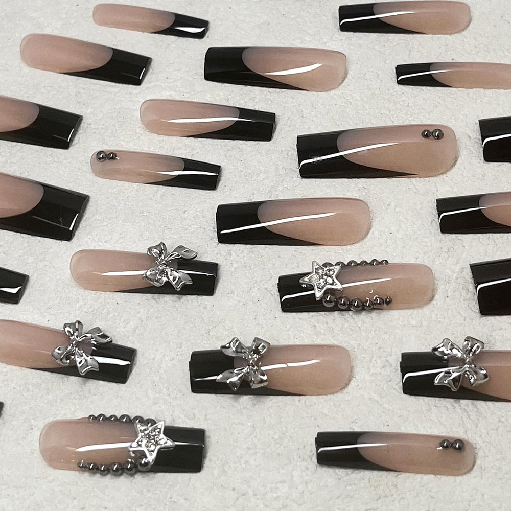 Set de uñas Jremg Frances negras 24 piezas con lima y herramientas incluidas.