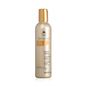 KeraCare, botella de acondicionador hidratante, suaviza y protege cabello teñido.