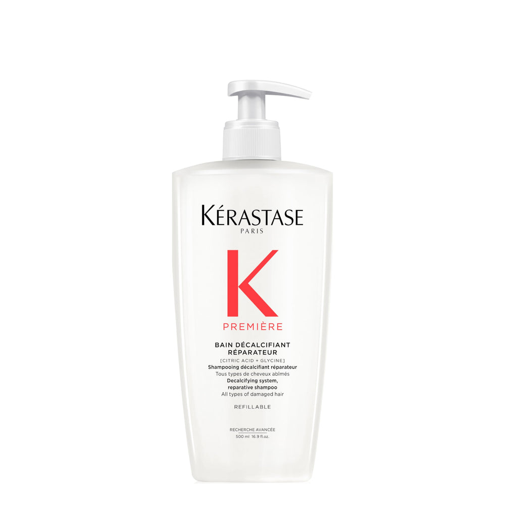 Kerastase Première Bain Descalcificador, botella mostrando etiqueta, descalcificación suave y limpieza eficaz