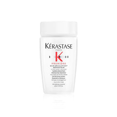 KÉRASTASE Premiere champú reparador sin sulfatos, botella visible para uso diario suave.