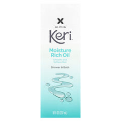 Aplicación del aceite de ducha Keri en la mano para suavidad de la piel.