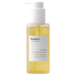 Knours desmaquillante 2 en 1, botella vertiendo aceite para limpieza suave.