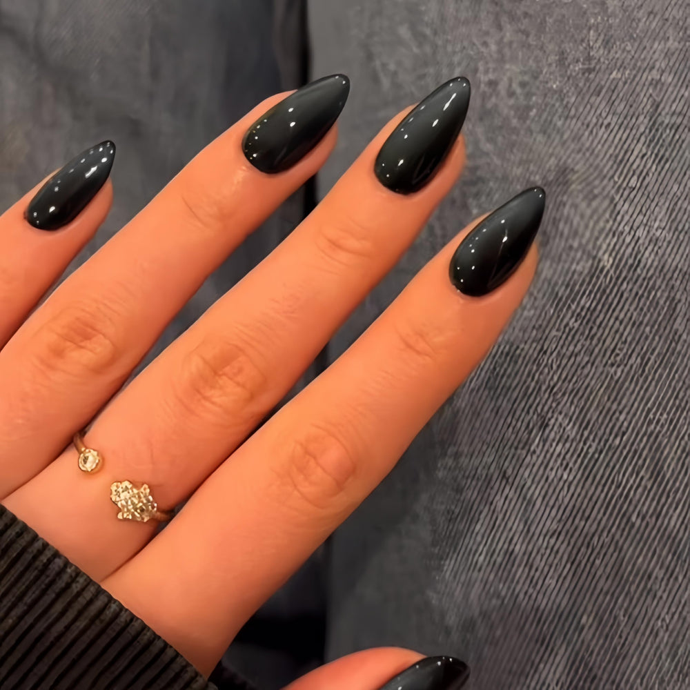 KQueenest Uñas negras con brillo, diseño Cat Eye para looks festivos.