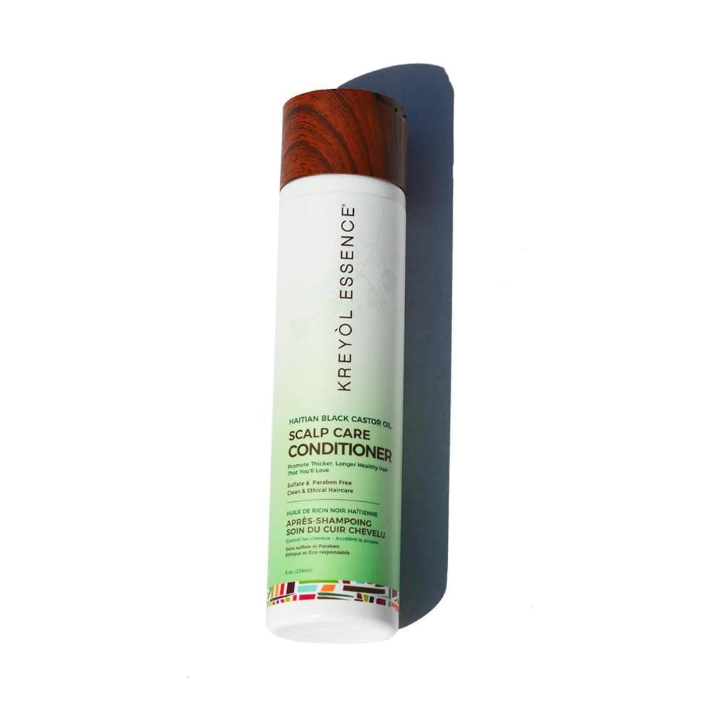 Acondicionador Kreyol Essence con aceite de ricino haitiano para fortaleza capilar.
