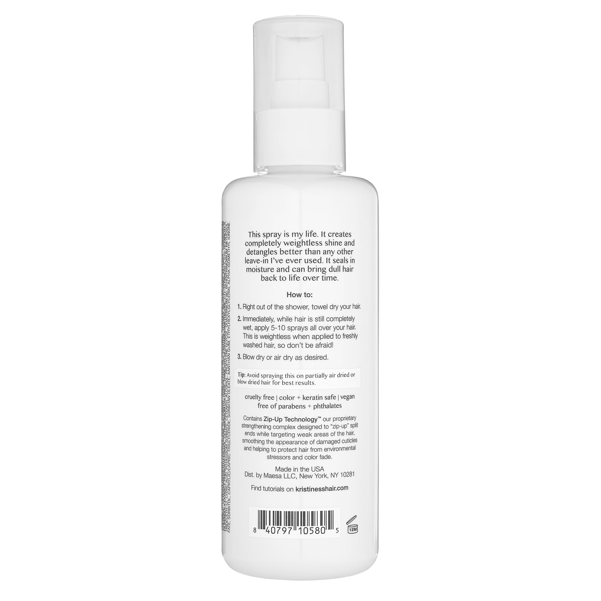 Aplicación de Kristin Ess Hair Instant Lift en cabello mojado para volumen uniforme