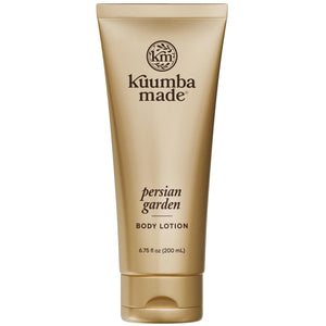 Kuumba Made loción corporal jardín persiano, botella elegante para hidratación diaria suave.