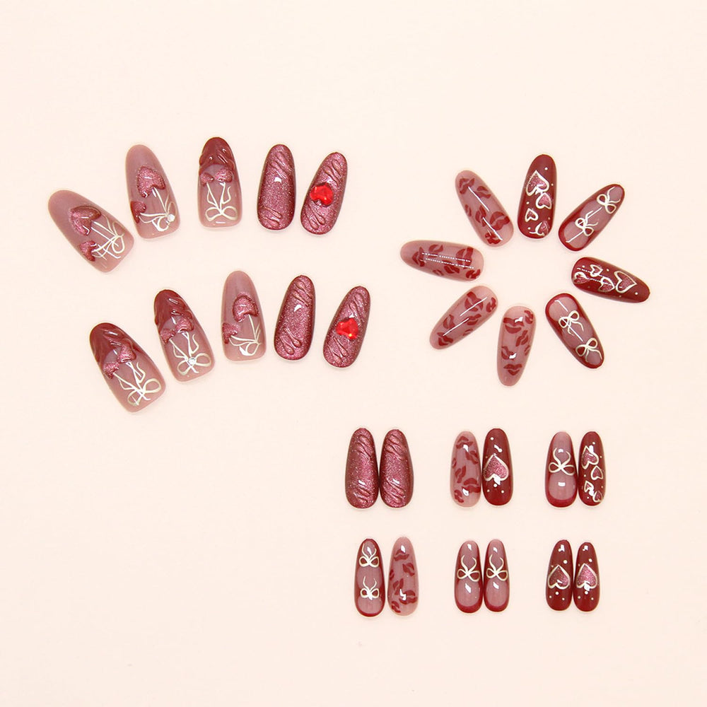 Uñas francesas rojas con corazón, diseño KZBTRBT para bodas
