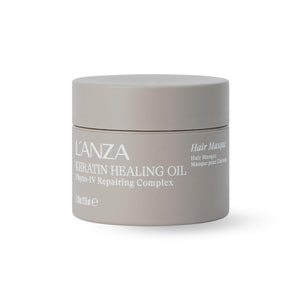 L’ANZA Keratin Healing Oil Masque, bote elegante que sugiere nutrición profunda.