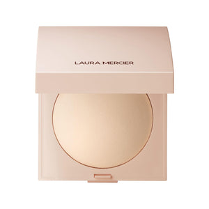 Laura Mercier Real Flawless polvo compacto con acabado luminoso para piel radiante.