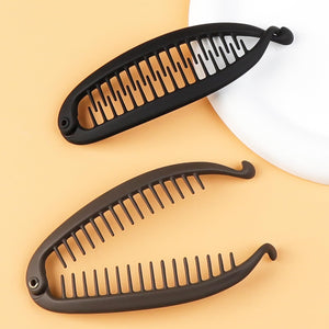 LLMSIX clip banana negro, dos piezas, ideal para peinados rápidos.