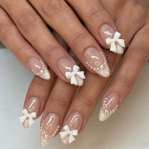 LRKNNO uñas en almendra francesas con lazo decorativo para un toque elegante.
