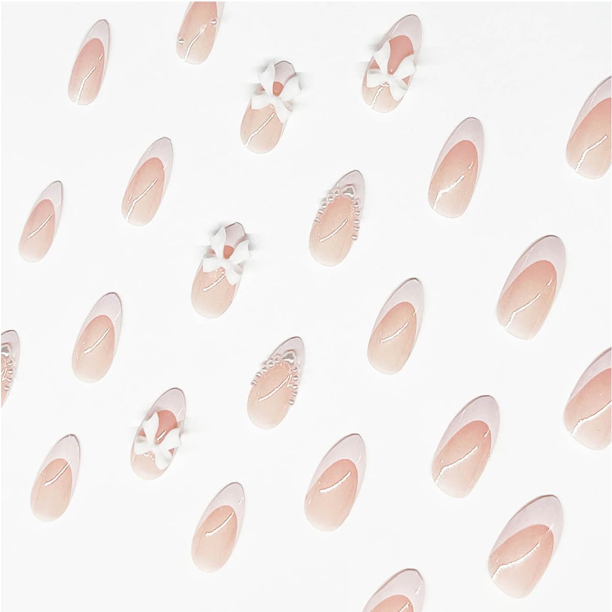 LRKNNO uñas almendra rosado neutro con lazo, ideal para fiestas y bodas.