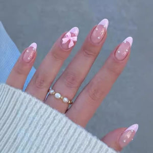 LY LANYOS uñas postizas lazo mariposa rosado, look elegante para cualquier ocasión.