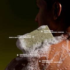 Barra exfoliante MALIN+GOETZ, textura cremosa que deja la piel más suave y clara.