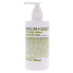 MALIN+GOETZ loción corporal de ron en botella, hidratación suave para todo el día.