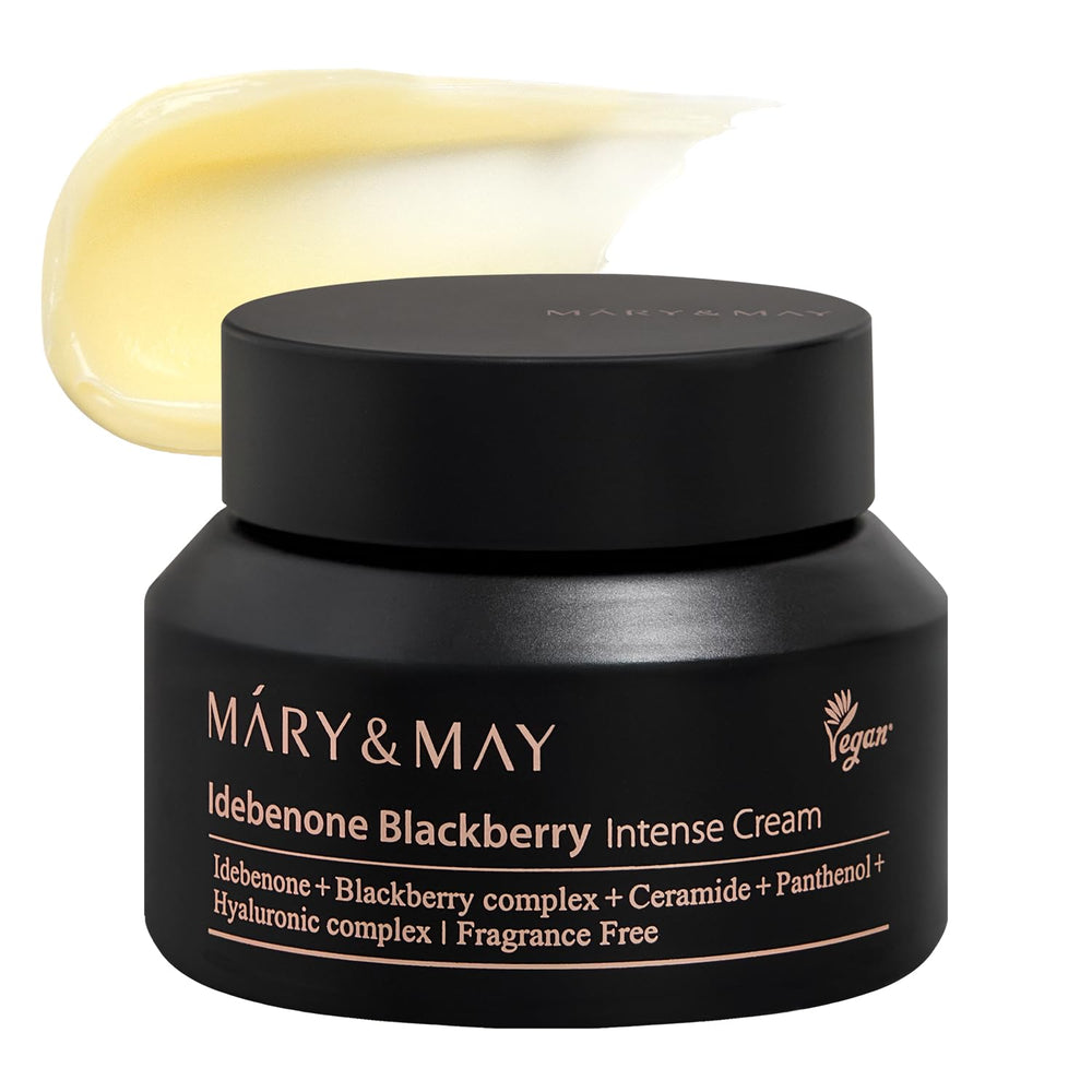 Mary&May Idebenone Blackberry Cream, textura dorada que se funde para piel suave y luminosa.