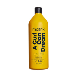 Matrix A Curl Can Dream Champú, botella frontal, definición de ondas con hidratación ligera.