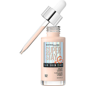 Maybelline Super Stay Skin Tint vertido en la botella, textura suave y acabado natural
