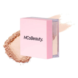 MCoBeauty polvos sueltos Cool & Set, empaque elegante para fijar maquillaje.