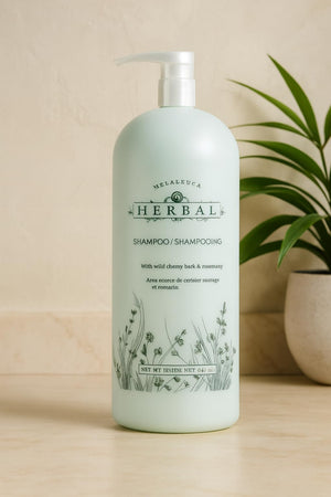 Melaleuca Champú Herbal en envase familiar de 32 oz, listo para uso diario.
