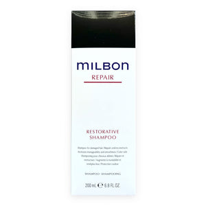 Milbon Champú Restaurativo en botella, nutre y fortalece el cabello dañado.