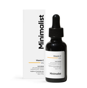 Minimalist Suero Vitamina C: frasco destacando la concentración para iluminación suave
