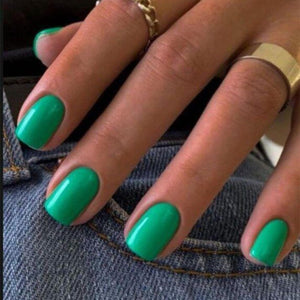 Modelones uñas postizas verdes en empaque, lista para elegir tu talla