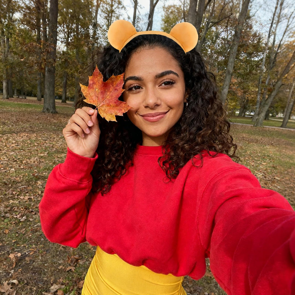 Orejas redondeadas de la diadema oso amarillo, aspecto adorable